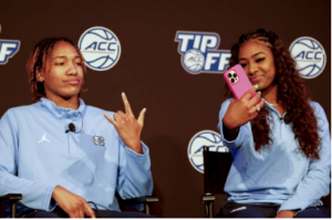 Junior guards Kennedy Todd-Williams poses for a selfie taken by Deja Kelly at an ACC Tipoff Media Day event in 2022.